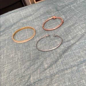 3 bracelets 2 are Kate spade